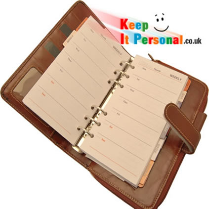 leather organiser open to reveal daily planner