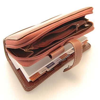 leather organiser open to reveal pencil case compartment
