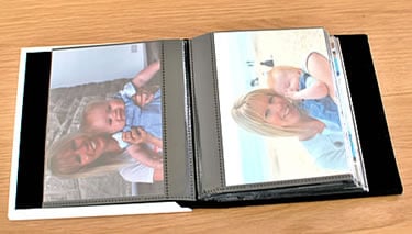 personalised baby album holding 6x4 photographs in sleeves